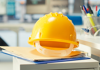 close up yellow hardhat empty solar plant facility 1 1 ESC IDHSE - International Diploma in Health and Safety Engineering Redhat Safety Training Consulting