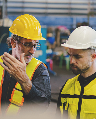 medium vecteezy two men in safety gear are looking at a machine 53267180 medium 1 ESC IDHSE - International Diploma in Health and Safety Engineering Redhat Safety Training Consulting